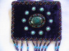 Deep Purple small bag w/ 10 turquoise beads around center stone
